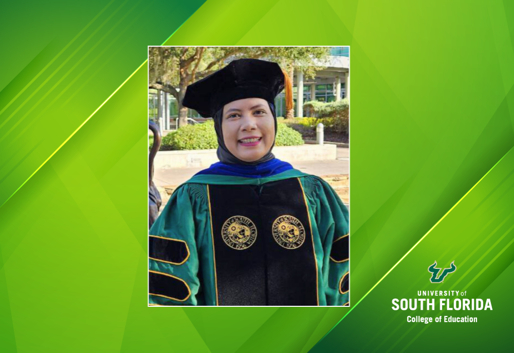 Umi Saidah in her University of South Florida doctoral regalia.