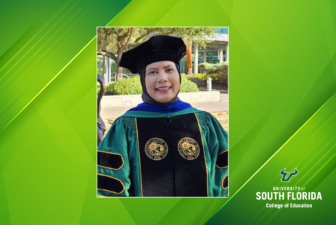 Umi Saidah in her University of South Florida doctoral regalia.