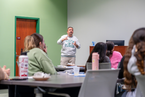 Zafer Unal discussing artificial intelligence with SunCoast Area Teacher Training students on January 21, 2025.