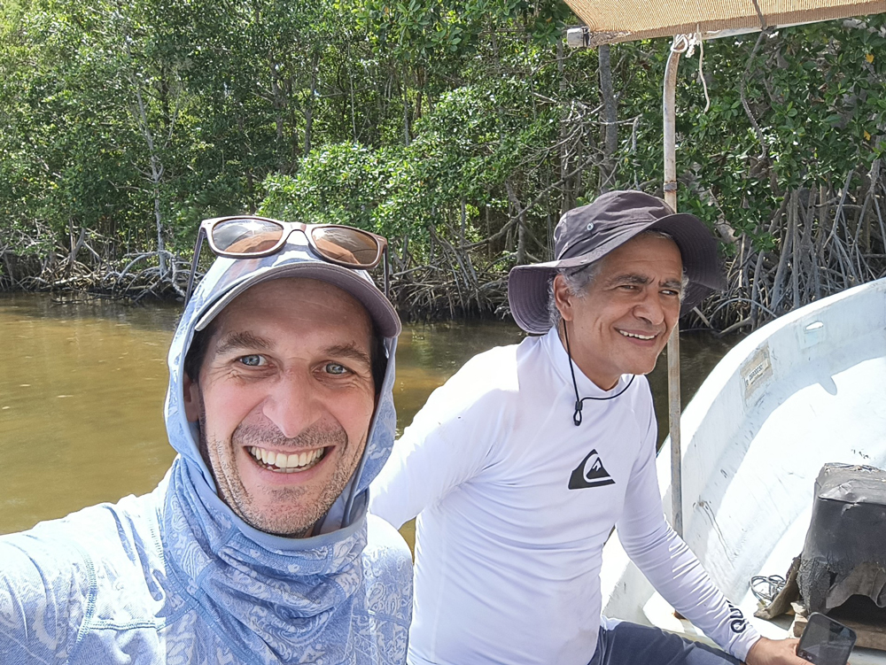 Mauricio Arias and his host (Paulo Salles) exploring mangroves along the Yucatan Peninsula