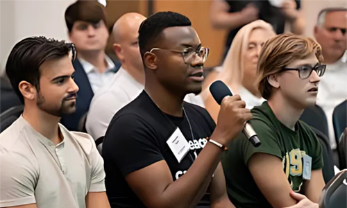 student holding mic