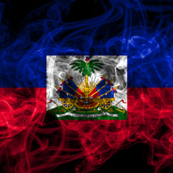Thumbnail image depicting a Haitian flag encircled in wispy smoke