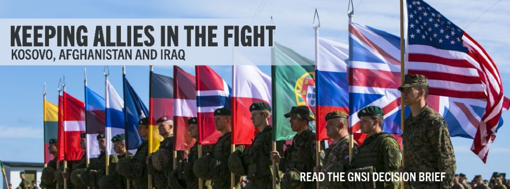 Military personnel holding flags of the USA and allied countries with overlaid text of: Keeping Allies in the Fight: Kosovo, Afghanistan and Iraq