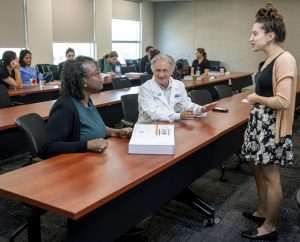 Dr. Judette Louis, professor, and Dr. Charles J. Lockwood, dean of the Morsani College of Medicine and executive vice president of USF Health, signed copies of their book Creasy & Resnick’s Maternal-Fetal Medicine: Principles and Practice.