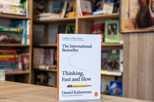 Copy of book, Thinking Fast and Slow, in library 