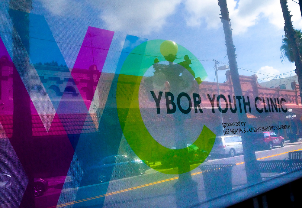 Storefront sign of the Ybor Youth Clinic