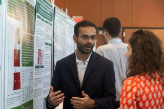 Parth Shah presenting his research poster