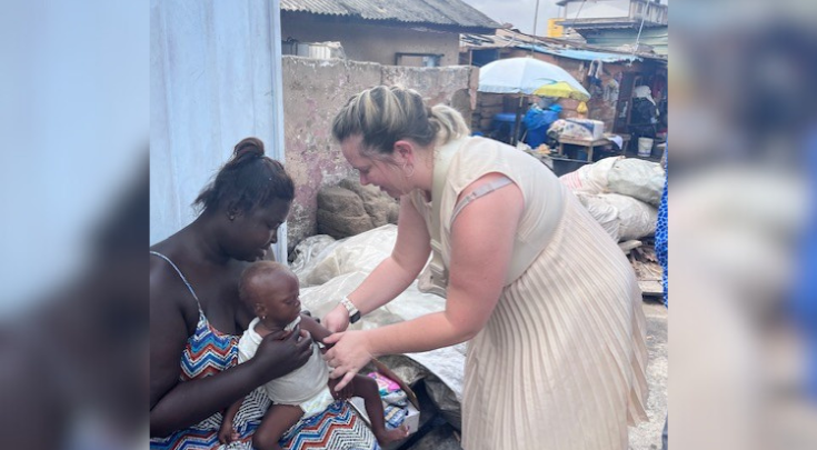 two women and a baby