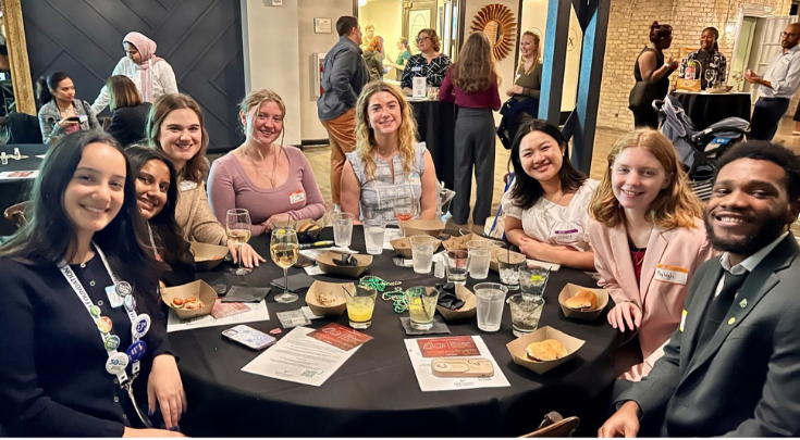 people around a dining table