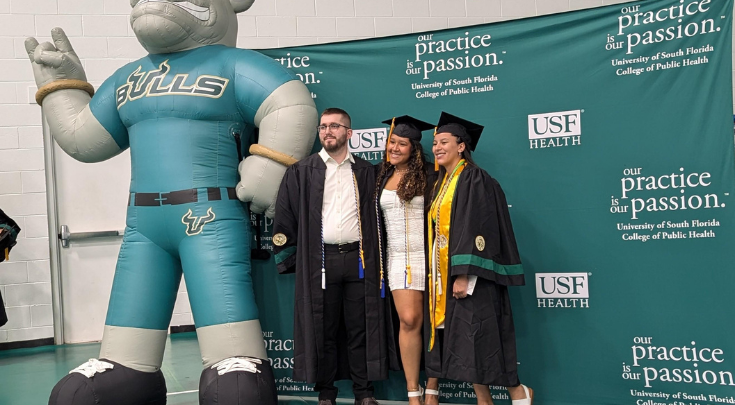 graduates posing for a picture