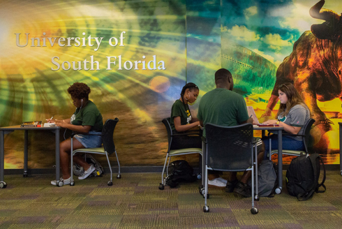 students sitting at tables