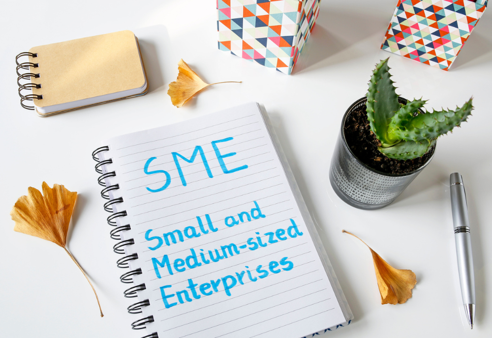 Small And Medium-sized Enterprises written in a notebook on white table