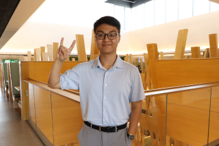 Alex Vu smiles at the Judy Genshaft Honors College