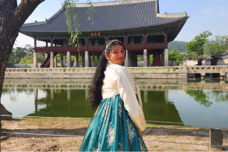 Alina John in south Korea wearingbtraditional Korean garb