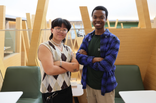 Honors students and 2024 Muma College of Business Awardees Yuki Shao and O'Carson Fils