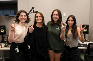 Honors students Reaghan Ard and Maria Lares-Galavis pose with Honor Roll Podcast Hosts Caroline Merriman and Fabiana Requena