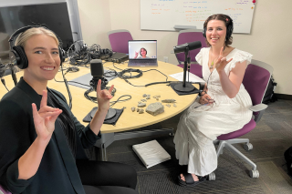 Honors student Isabel Delgado Frontera appears on a laptop screen while Dr. Lydia Wassink and Honor Roll Podcast host Caroline Merrimen sit at a table with recording equipment