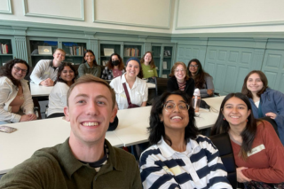 Kobe Phillips smiles with fellow students in germany