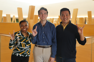 From left to right: Anrae Stephenson-Fraser, Martin Ladjmi, and Dr. Kevin Lee smile at the Honors College