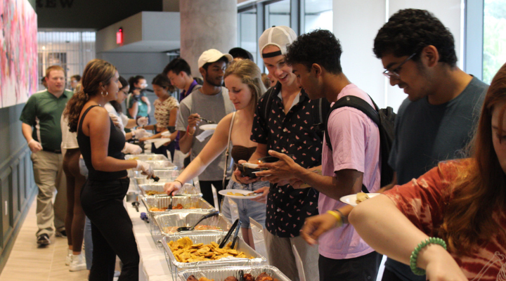 Honors students enjoy tapas at the Judy Genshaft Honors College Tapas Night Study Abroad Expo