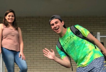 Hunter Goldenberg waves on the steps of the ALN building