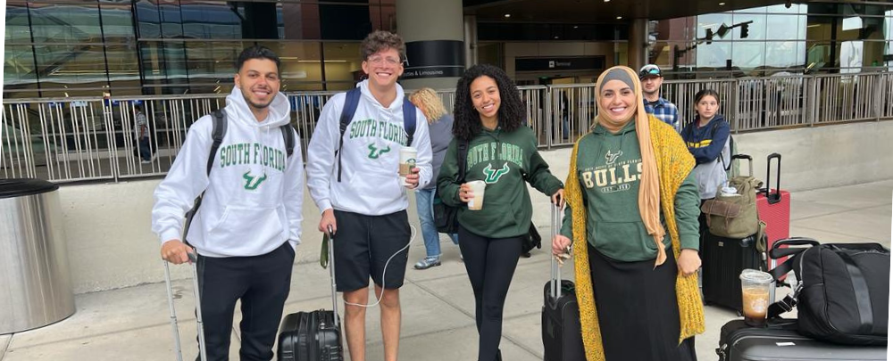 Amber Johnson, Taha Ahmed Feddoul, Ghali Omar Boutaib, and Dr. Raja Benchekroun travel to represent USF at the 5th U.S. Universities Arabic Debate Competition in New York City.