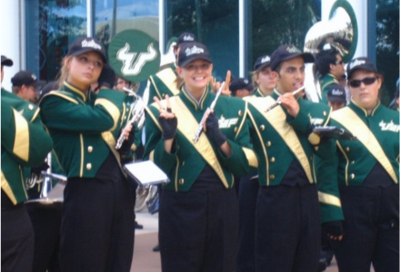 corbyn lichon playing piccolo for the USF herd of thunder marching band