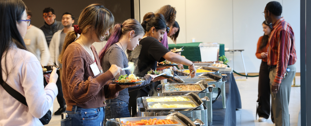 Honors students line up at the Thanksgiving buffet.