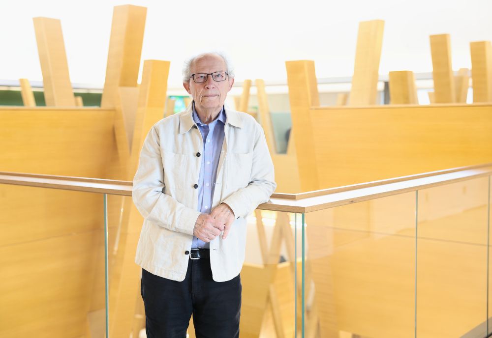 Rt Hon. Henry McLeish poses in Honors building atrium