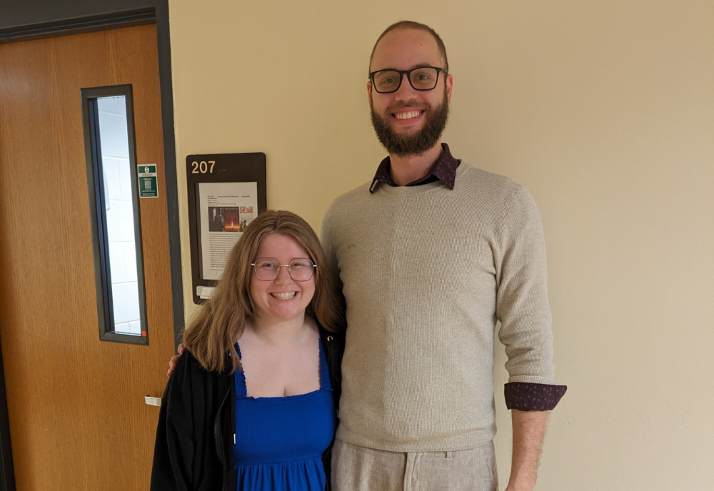 USF Applied Linguistic students Molly Schilling and Larry Grullon-Polanco smile for a photo. 