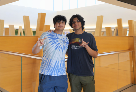 Jude and Jacob Delikat posing in Honors Atrium