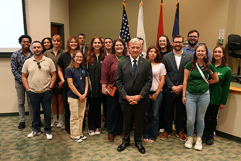 Students from the The Global and National Security Institute’s Future Strategist Program pose with General Frank McKenzie.