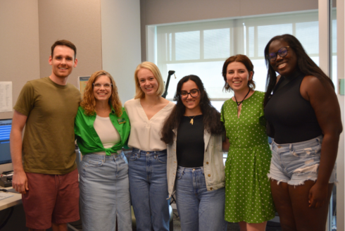 Honors alumni Dr. Ife Bolujo, Dr. Trent Lippert, Dr. Karina Bowers, and Dr. Sarah Awshah smile with Dr. Lindy Davidson and the student host in the AV studio. 