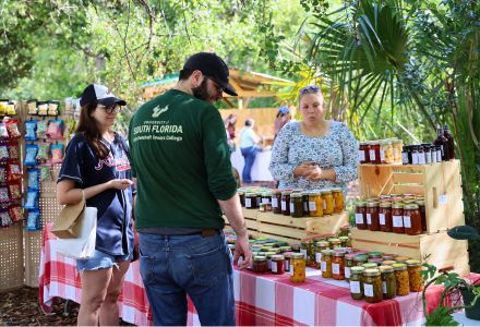 A booth selling homemade jam at the 2024 Climate Teach-in farmer's market event.