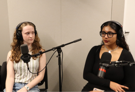 Honors student Rachel Weitz and guest host Cayley McCloskey record an episode of the Honor Roll Podcast.