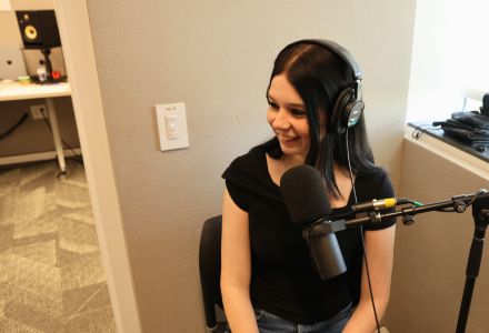 Katelynn Paciorek smiling in the Honor Roll podcast room.