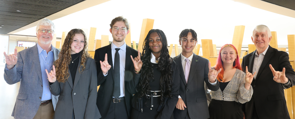 Honors students pose with Dean Adams and Dr. Ralph Wilcox in the Honors atrium