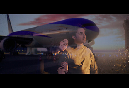 Marina Davidovic stands with man looking out window at airplane