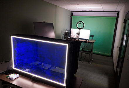 wide shot of tampa faculty production room. 