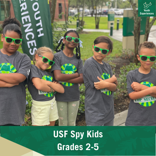 USF Spy Kids with text stating " USF Spy Kids Grades 2-5"