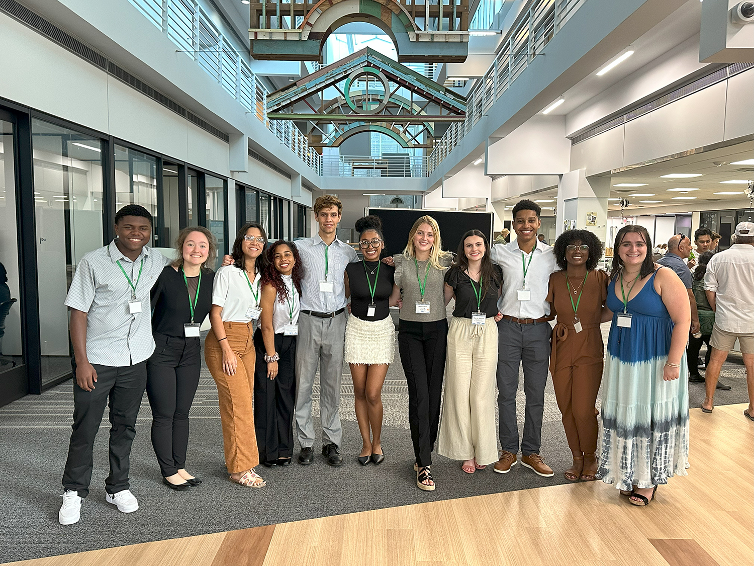 The Making Waves cohort celebrates after presenting their research posters at the USF St. Petersburg Undergraduate Research Symposium at the Nelson Poynter Memorial Library. Photo Credit: Jess Van Vaerenbergh