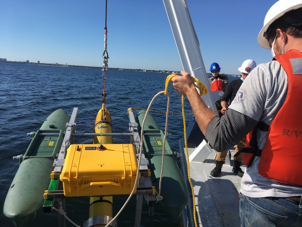After the calibration float was retrieved by its tether, the FIO crew hoisted it aboard and prepared for our return to Bayboro Harbor.