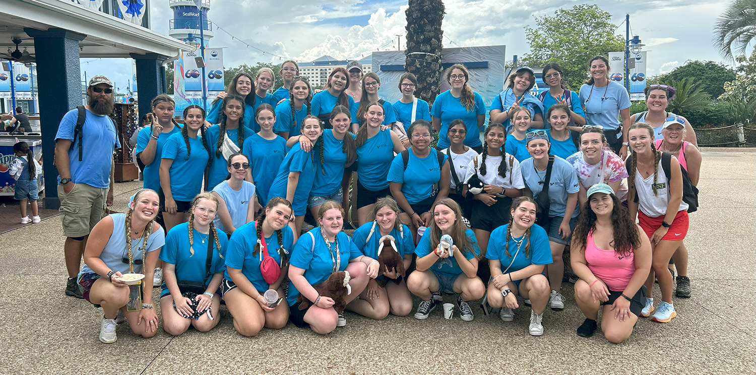 Campers celebrate a successful 2024 Oceanography Camp Especially for Girls at sea world.