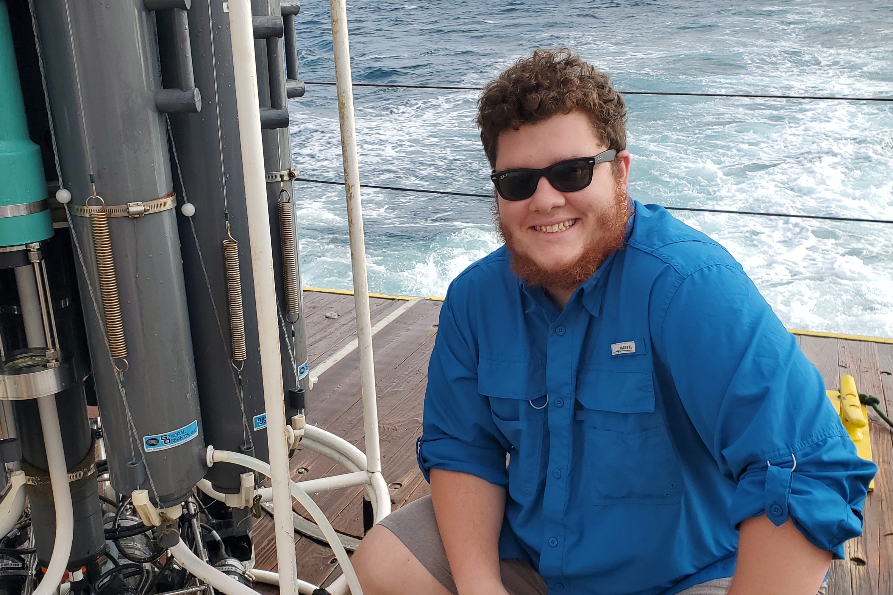 Sebastian DiGeromino samples water on the R/V Walton Smith research cruise.