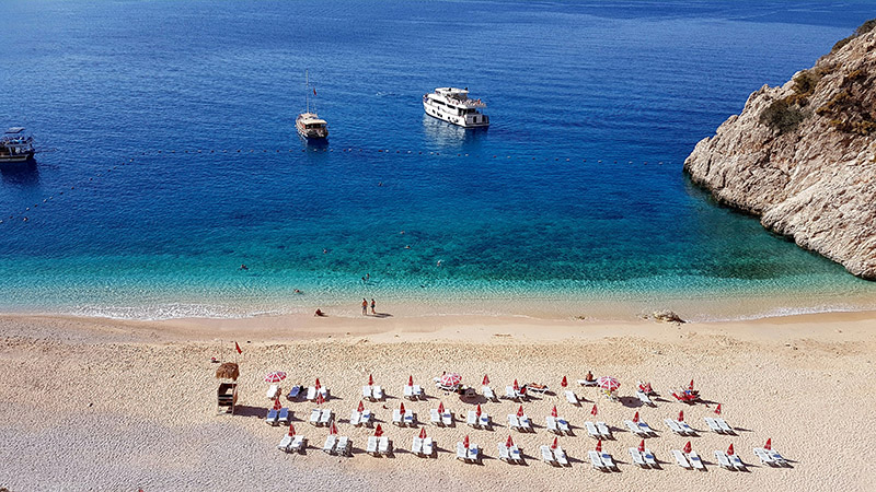 Skeletons and shells from an invasive species of foraminifera are helping build beaches like this one in the eastern Mediterranean Sea.