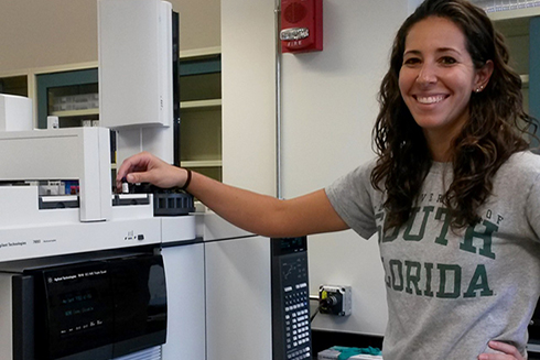 Susan Snyder, Ph.D. Candidate, operate a Gas Chromatography-Mass Spectrometry instrument at USF CMS. (Photo credit: C-IMAGE) 