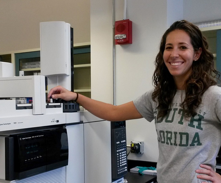 Susan Snyder, Ph.D. Candidate, operate a Gas Chromatography-Mass Spectrometry instrument at USF CMS. (Photo credit: C-IMAGE) 