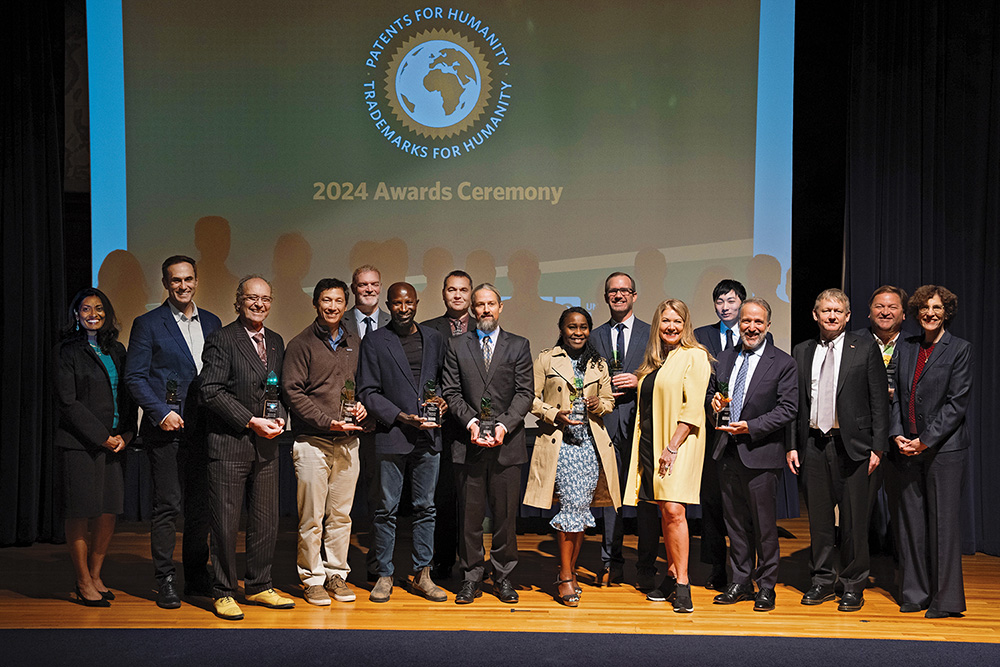 Group poses for 2024 awards ceremony at patents for humanity