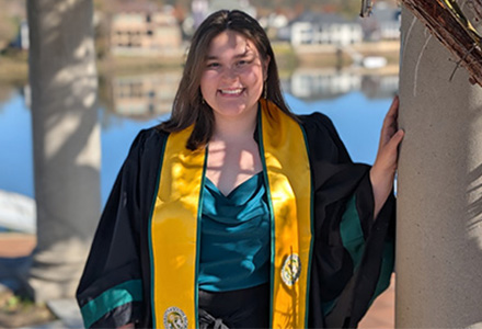 Serenity Poston-Hymel in her commencement regalia