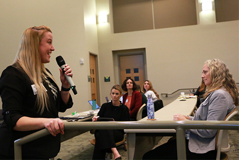 Elizabeth Dunn speaks to a conference room during the Tampa Bay hurricane sessions